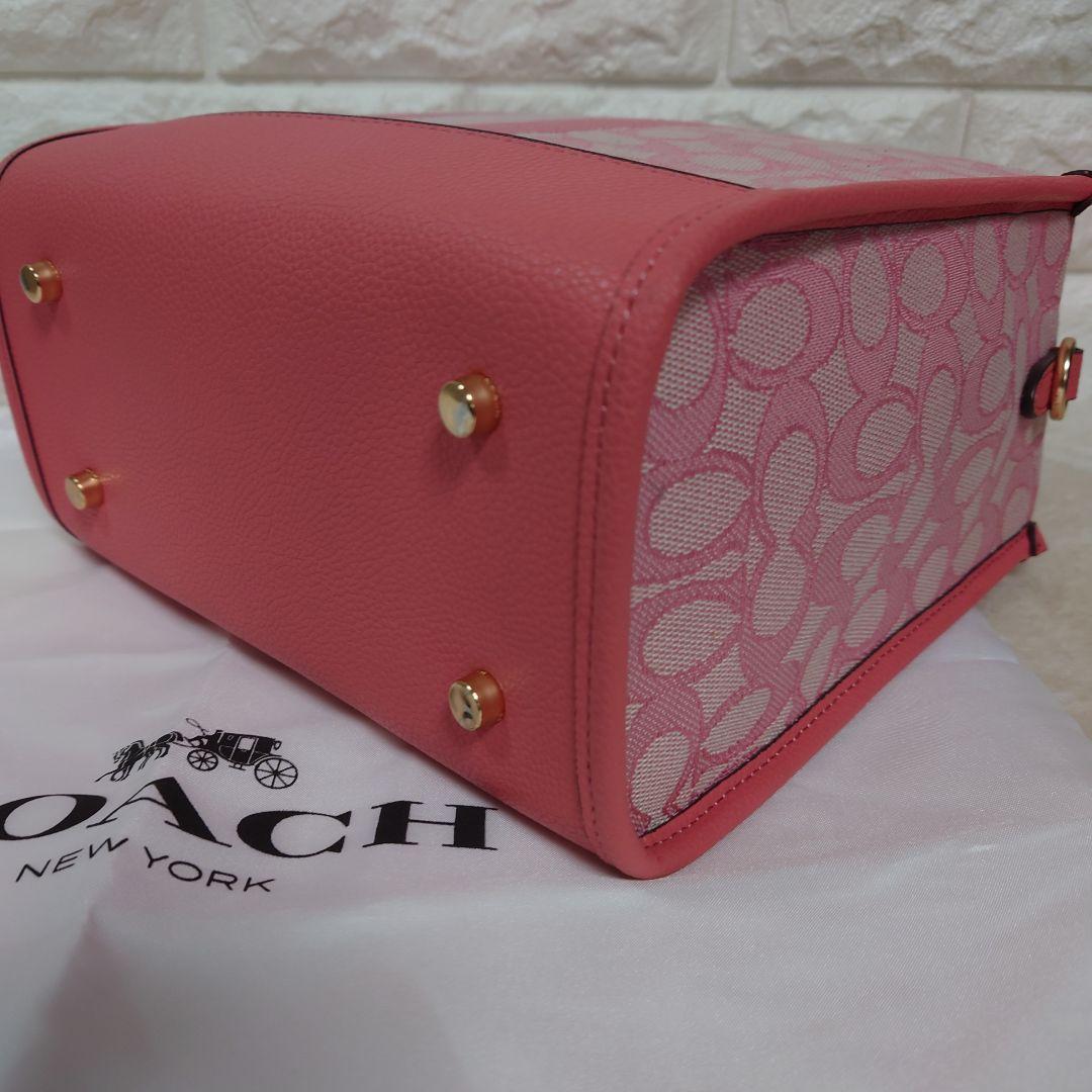 バッグ COACH Dempsey totebag Signature pink