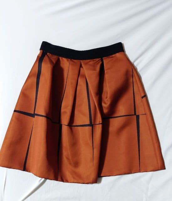 ♪【essence of ANAYI】オレンジ フレアスカート