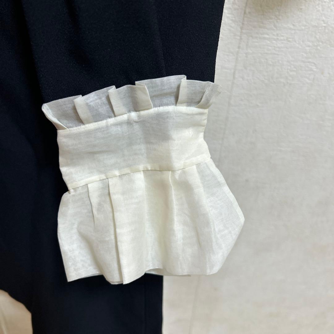 MIUMIUフリル付き黒ワンピース