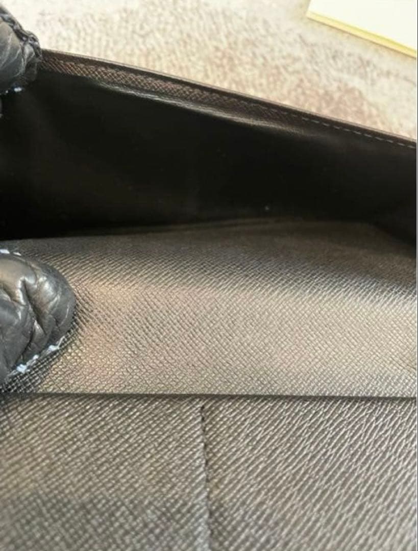 ルイヴィトン ダミエ グラフィット ヴェルティカルジッピーウォレット