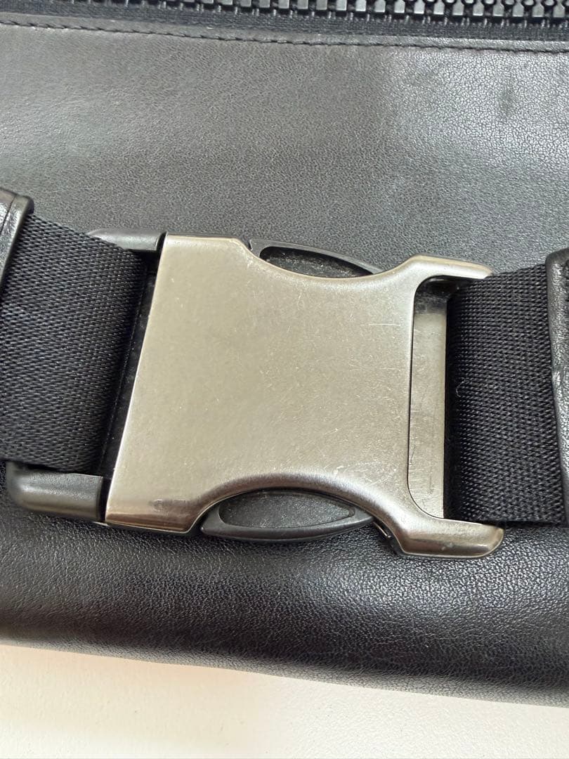 COACH ボディバッグ・ウエストポーチ オレンジと赤