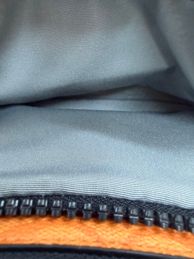 COACH ボディバッグ・ウエストポーチ オレンジと赤