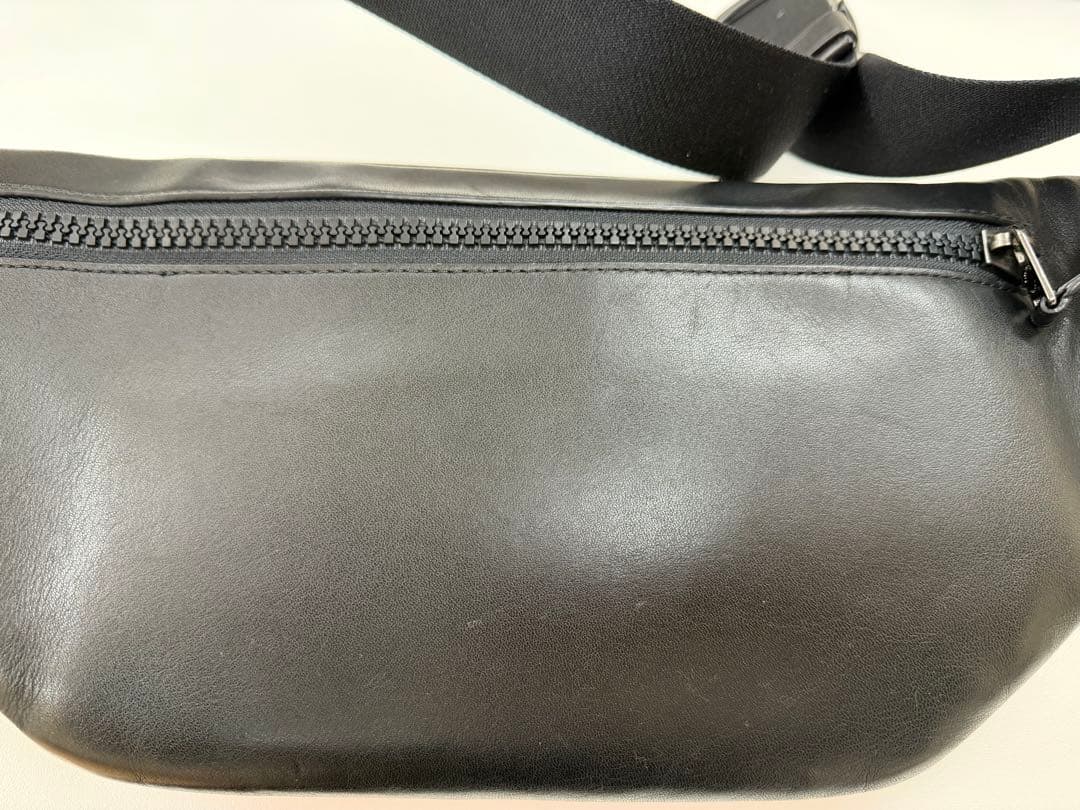 COACH ボディバッグ・ウエストポーチ オレンジと赤