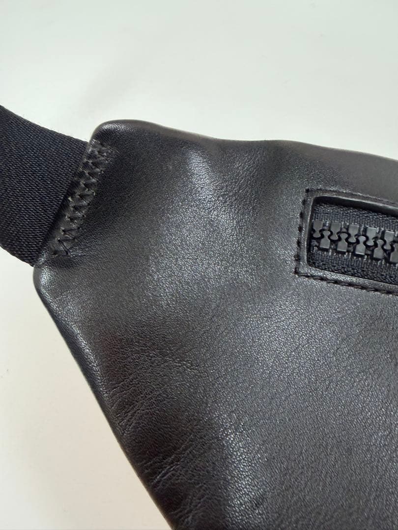 COACH ボディバッグ・ウエストポーチ オレンジと赤