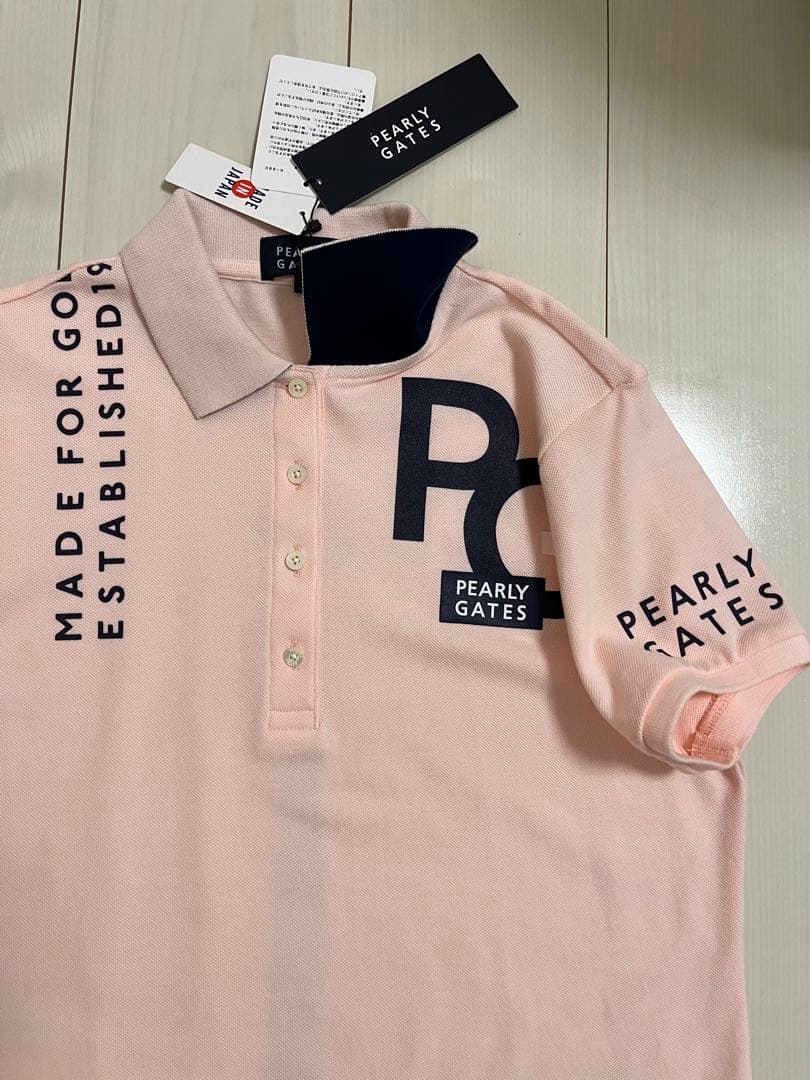 新品タグ付き　即完売さくら色ポロシャツ　スカートも出品してますよー