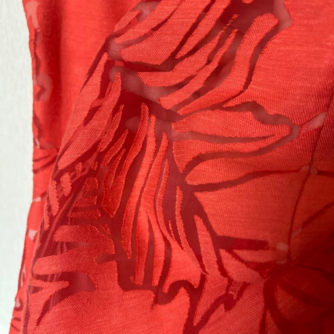 透かし織りの豪華なアンサンブルスーツ　オレンジ系