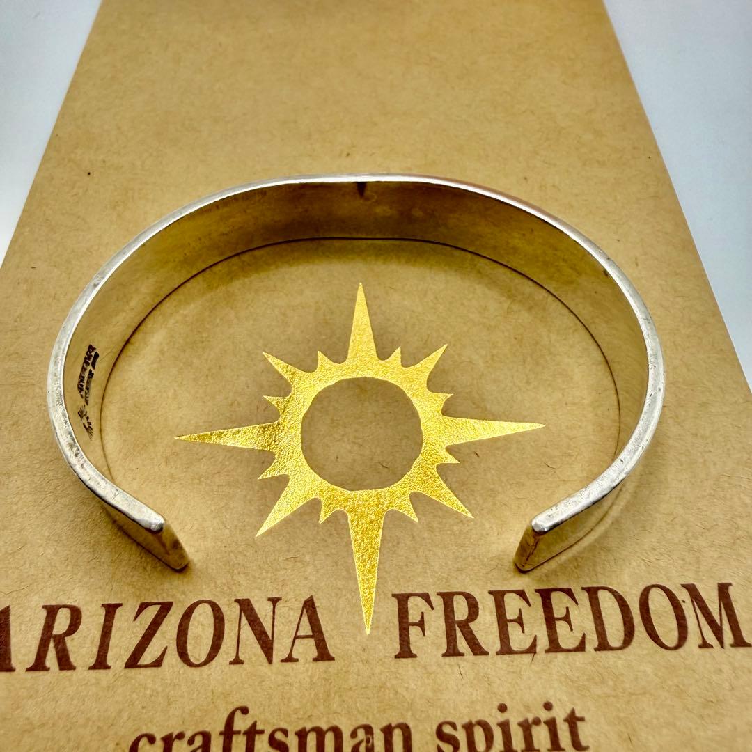 アリゾナフリーダム　k18太陽神付き平打バングル B-19a 定価89650円