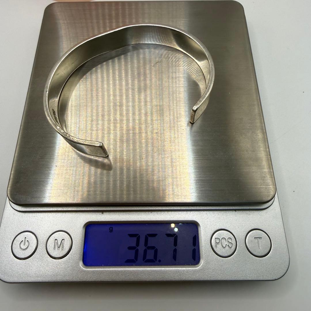 アリゾナフリーダム　k18太陽神付き平打バングル B-19a 定価89650円