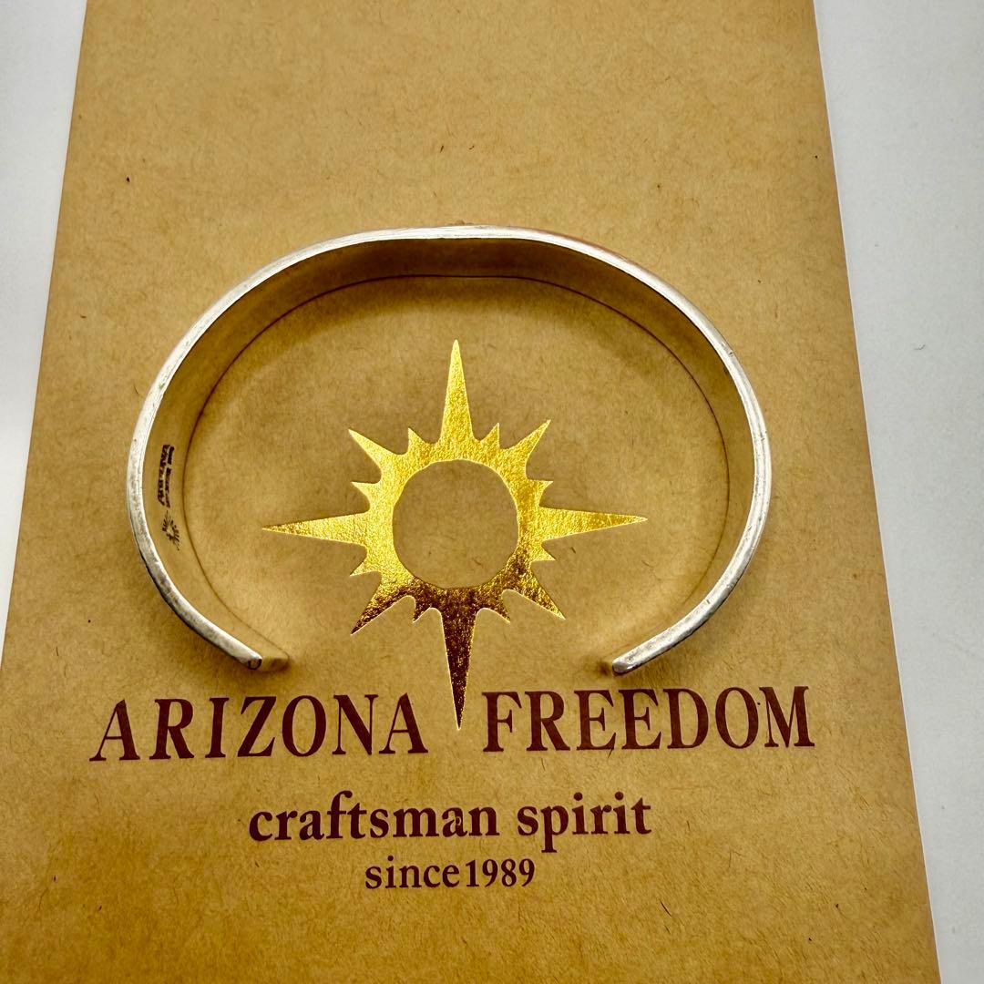 アリゾナフリーダム　k18太陽神付き平打バングル B-19a 定価89650円