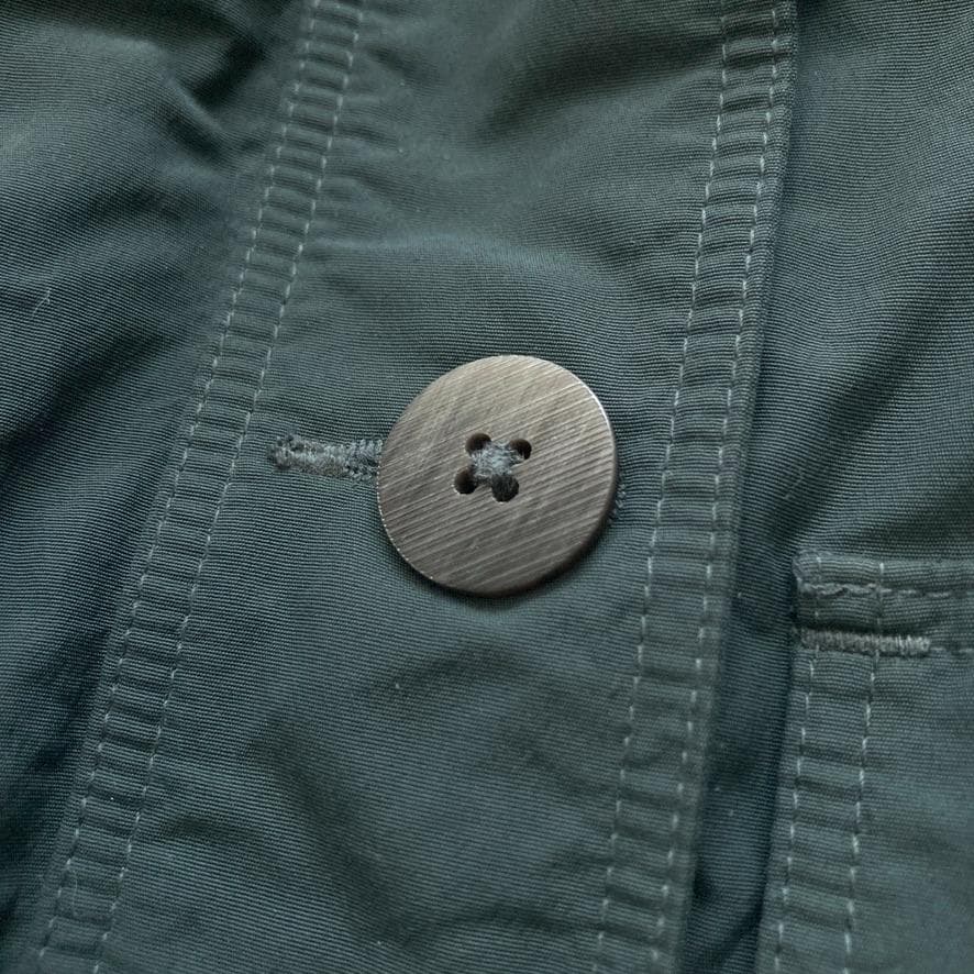 タ*カ様 【大人気美品】モンベル　現行 ハスキーコート ダウンジャケット グリー