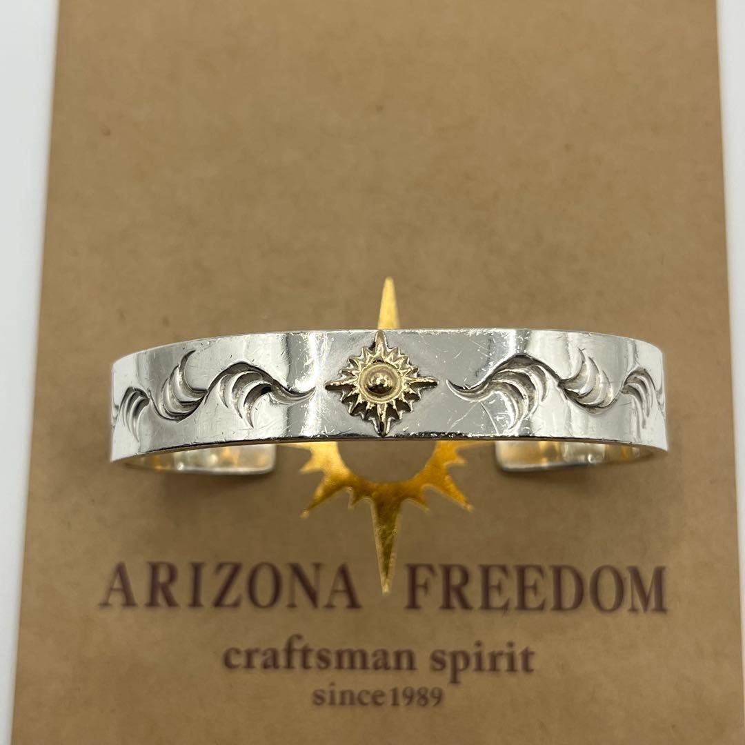アリゾナフリーダム　k18太陽神付バングル 12mm B-19b 定価95370