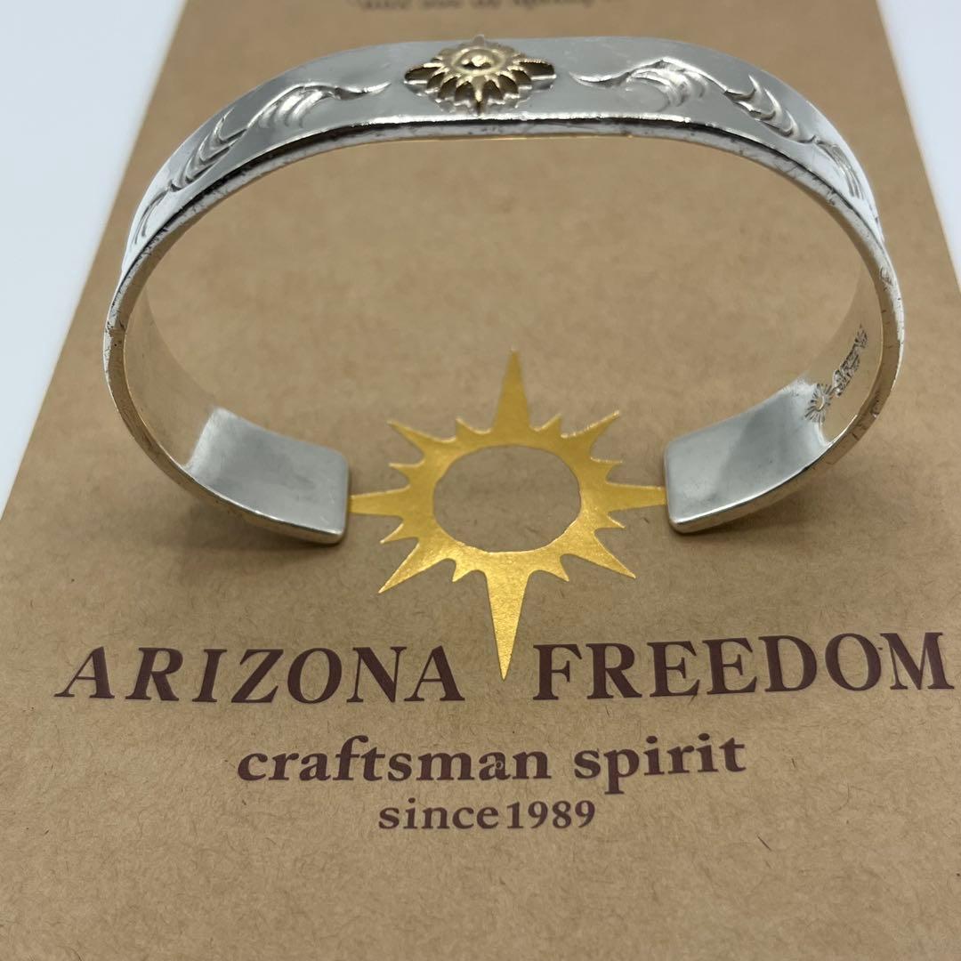 アリゾナフリーダム　k18太陽神付バングル 12mm B-19b 定価95370
