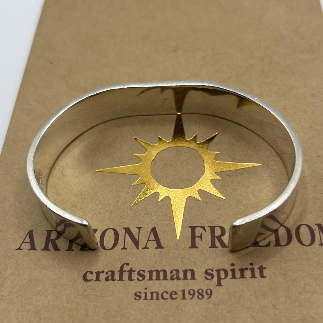 アリゾナフリーダム　k18太陽神付バングル 12mm B-19b 定価95370