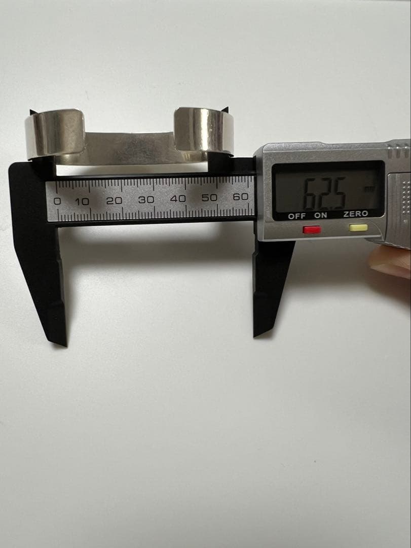 タディ&キング 平打ちバングル SV K18ロングホーンメタル