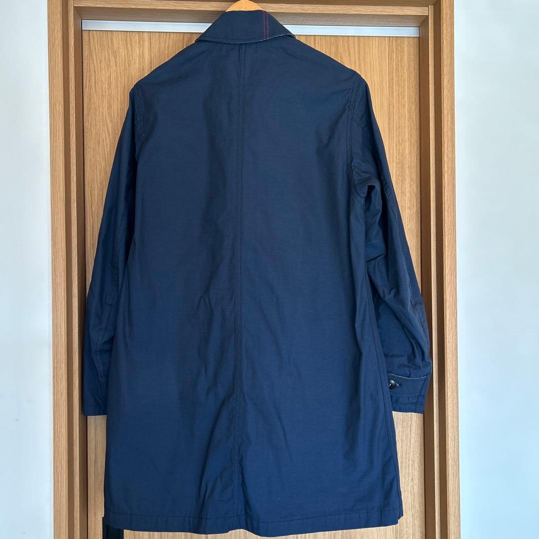 ANACHRONORMのステンカラーコート