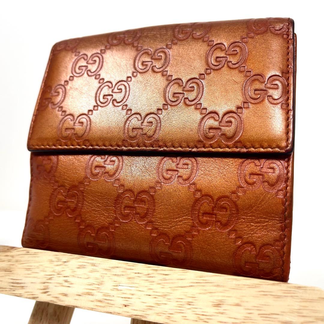 グッチ　二つ折り財布　ハートロゴプレート　GGシマレザー　型押しエンボス　美品