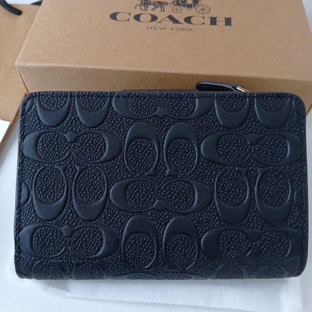✨️COACH ブラック シグネチャー✨️　二つ折り財布　保存袋＆お箱付き