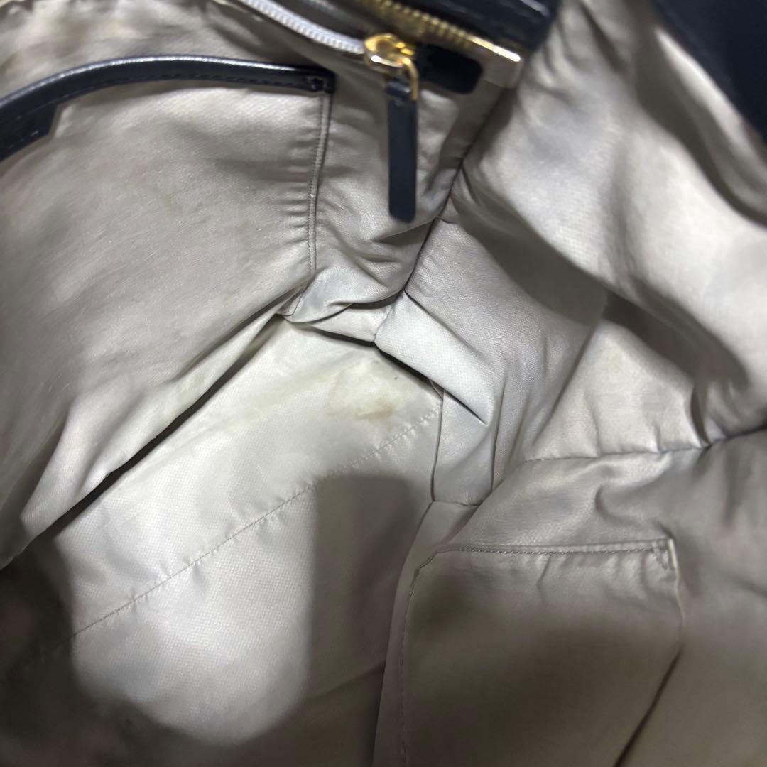 TUMI ニーナ ノースサウス トートバッグ レザー ブラック A4 ゴールド