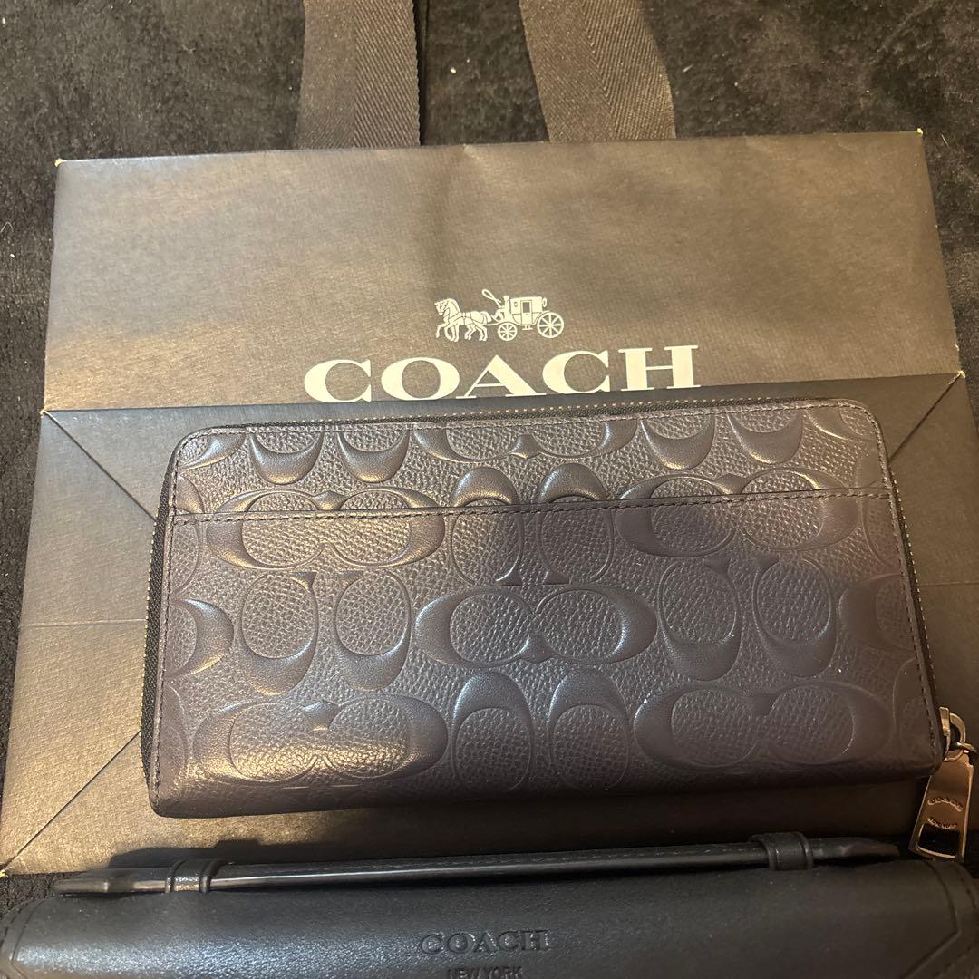 ゴ*ン様 COACH 型押しロゴ ブラック長財布