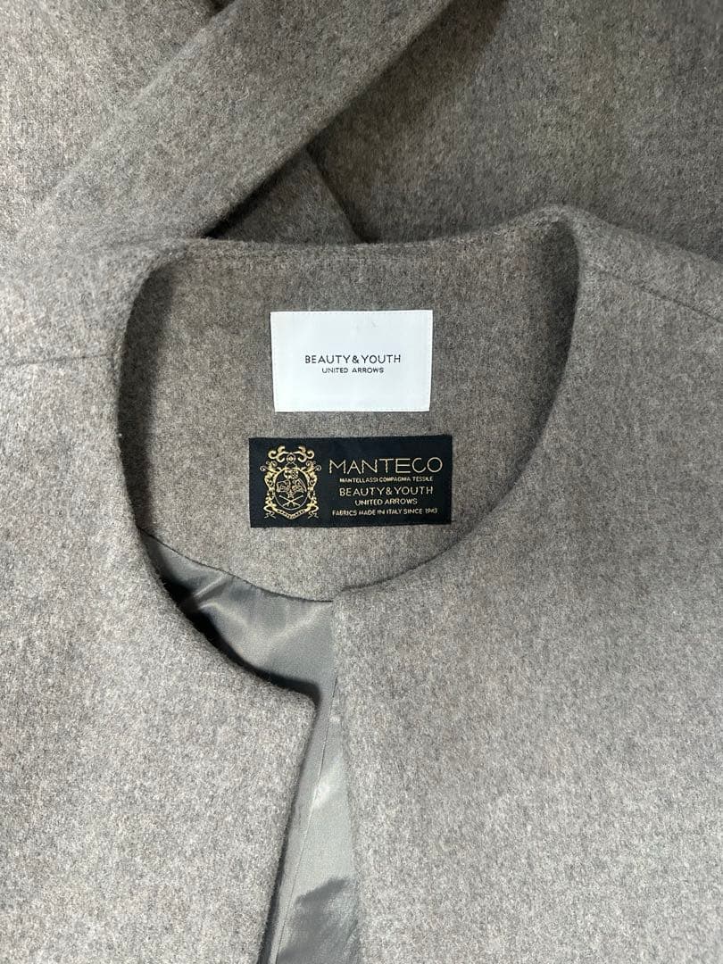 ビーバーノーカラーロングコート