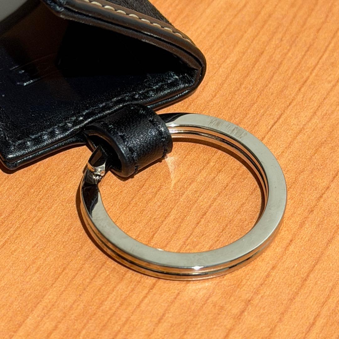 コーチ 手帳型 キーホルダー チャーム ブラック シグネチャー