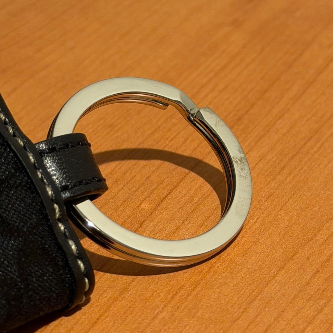 コーチ 手帳型 キーホルダー チャーム ブラック シグネチャー