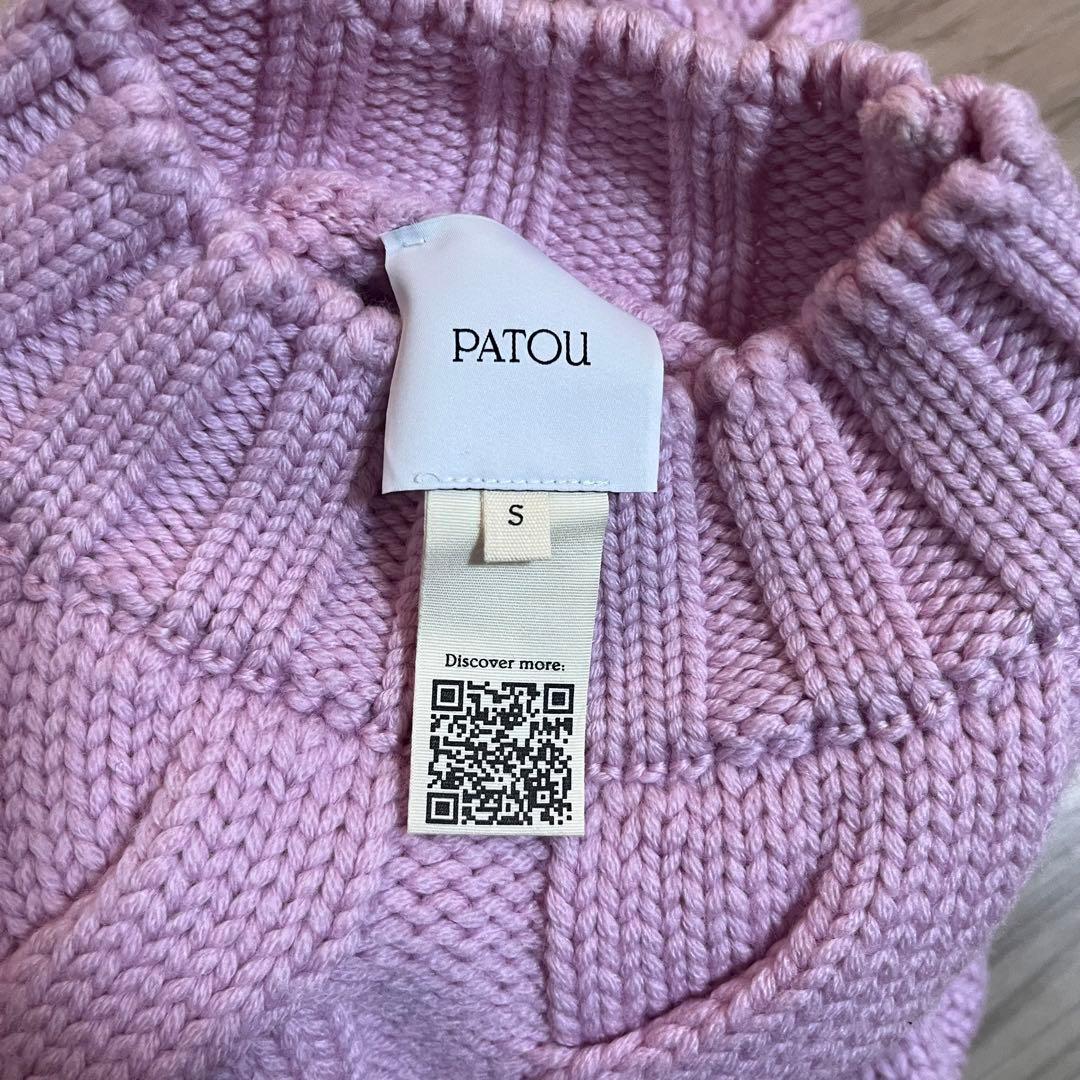 ケーブル編みピンク長袖ニットセーター