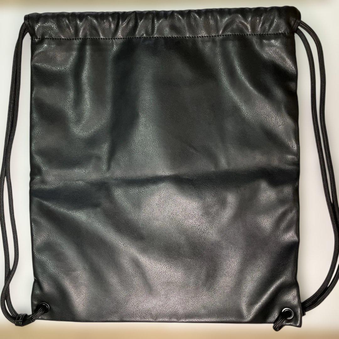 バッグ UNION Magazine backPack M's black swan