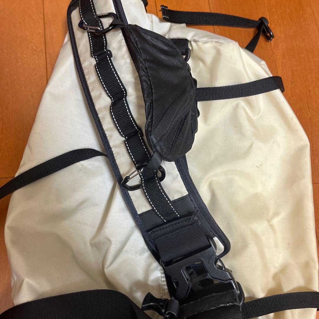 アンドワンダー　ショルダーバッグ メッセンジャーバッグ アイボリー/ブラック