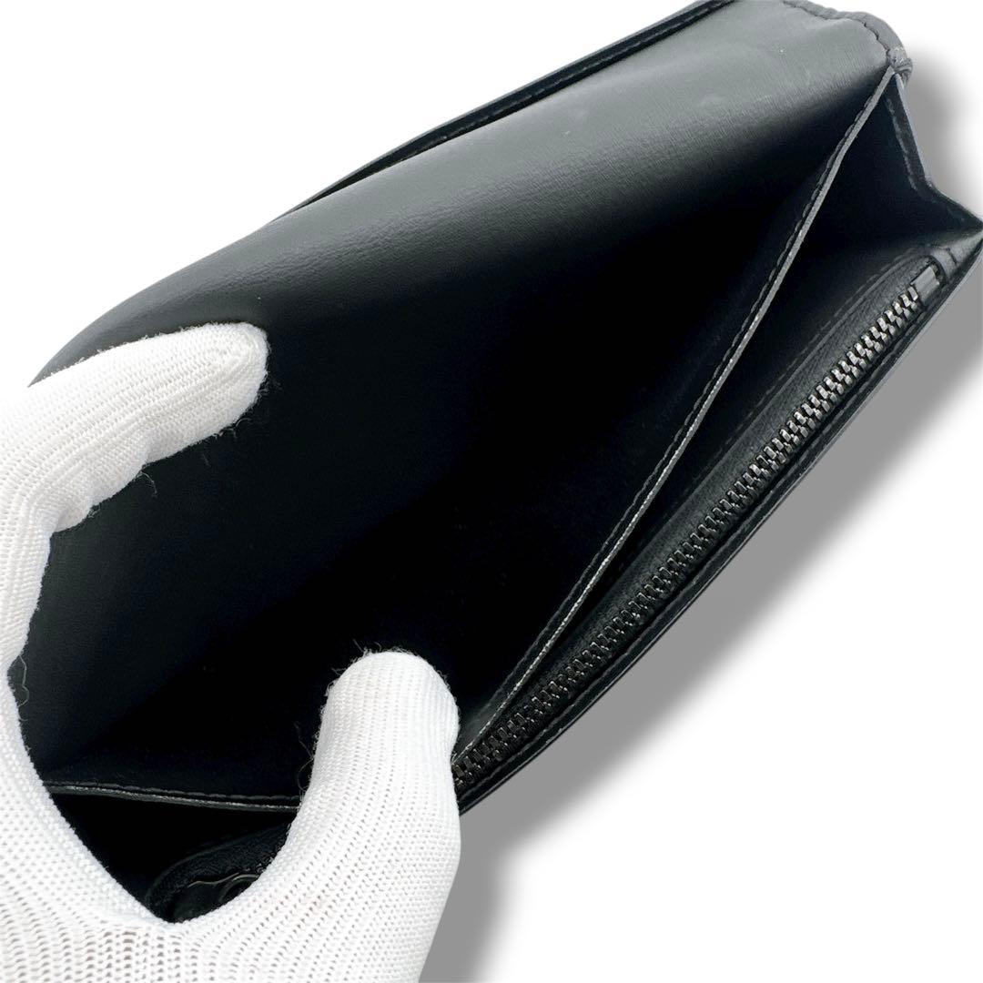 ルイヴィトン モノグラムシャドウ ポルトフォイユ ブラザ 二つ折り 長財布