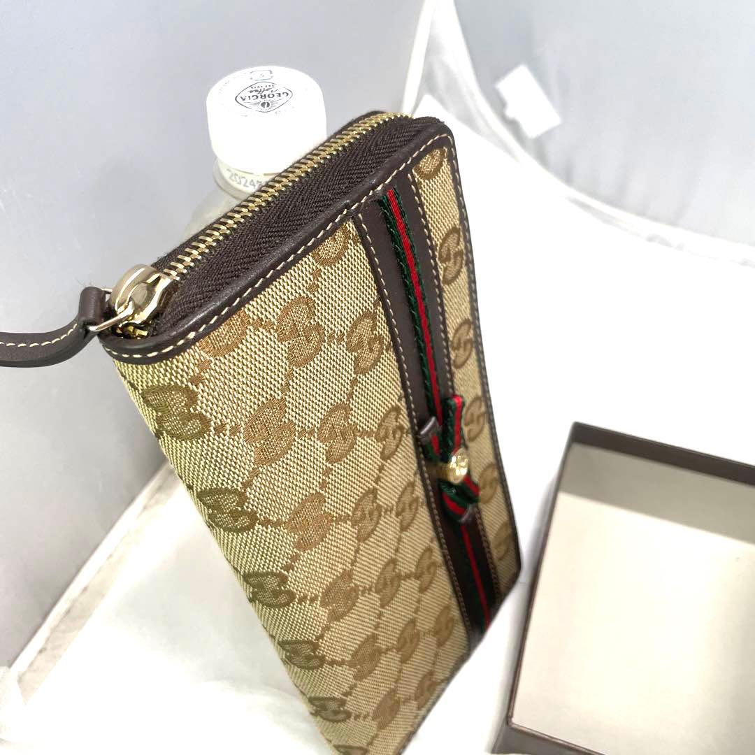 GUCCI グッチ　長財布　シェリーライン　リボン　　GG柄　ラウンドファスナー