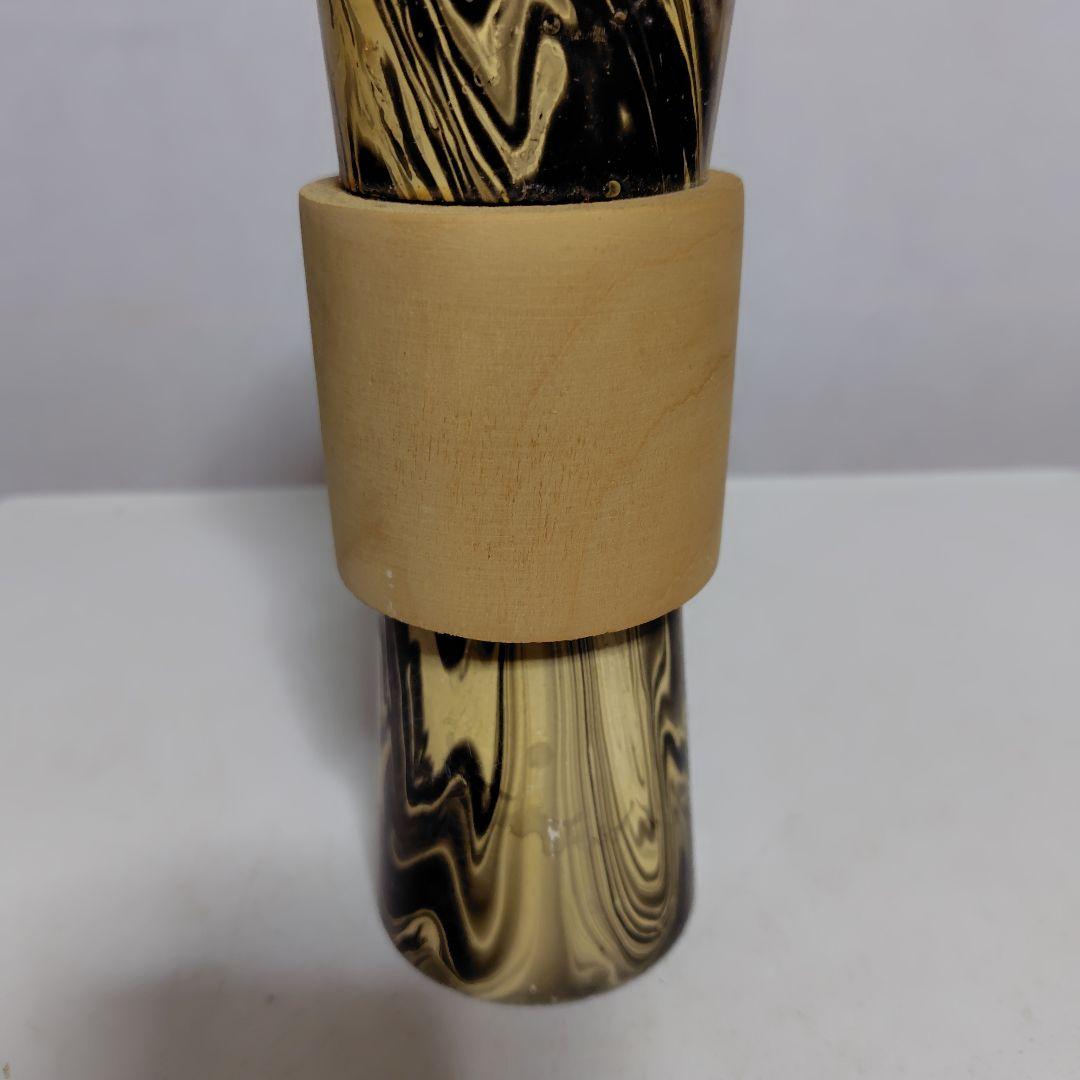 顔が優しい小芥子です。身体の帯が歴史です。