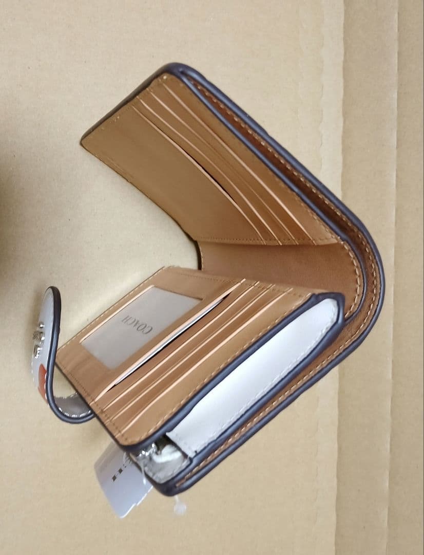 【オープン価格】COACH チェリー柄 二つ折り財布