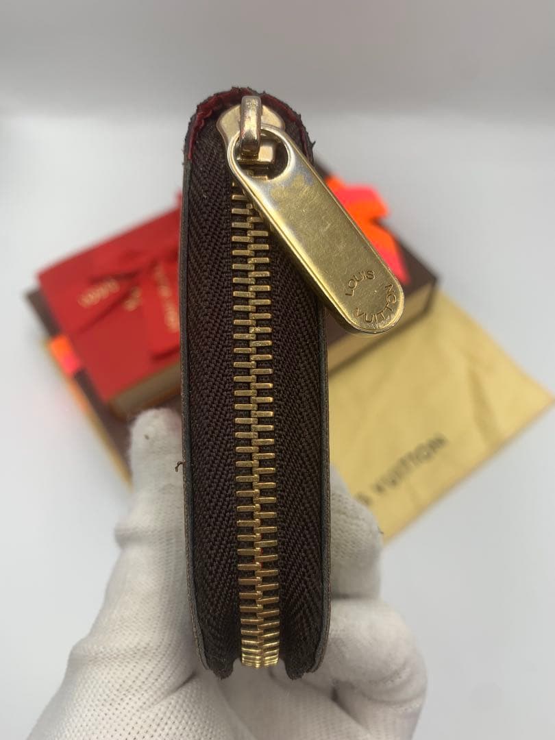 ルイヴィトン モノグラム ステッカー ジッピーウォレットコクリコ 長財布 P55