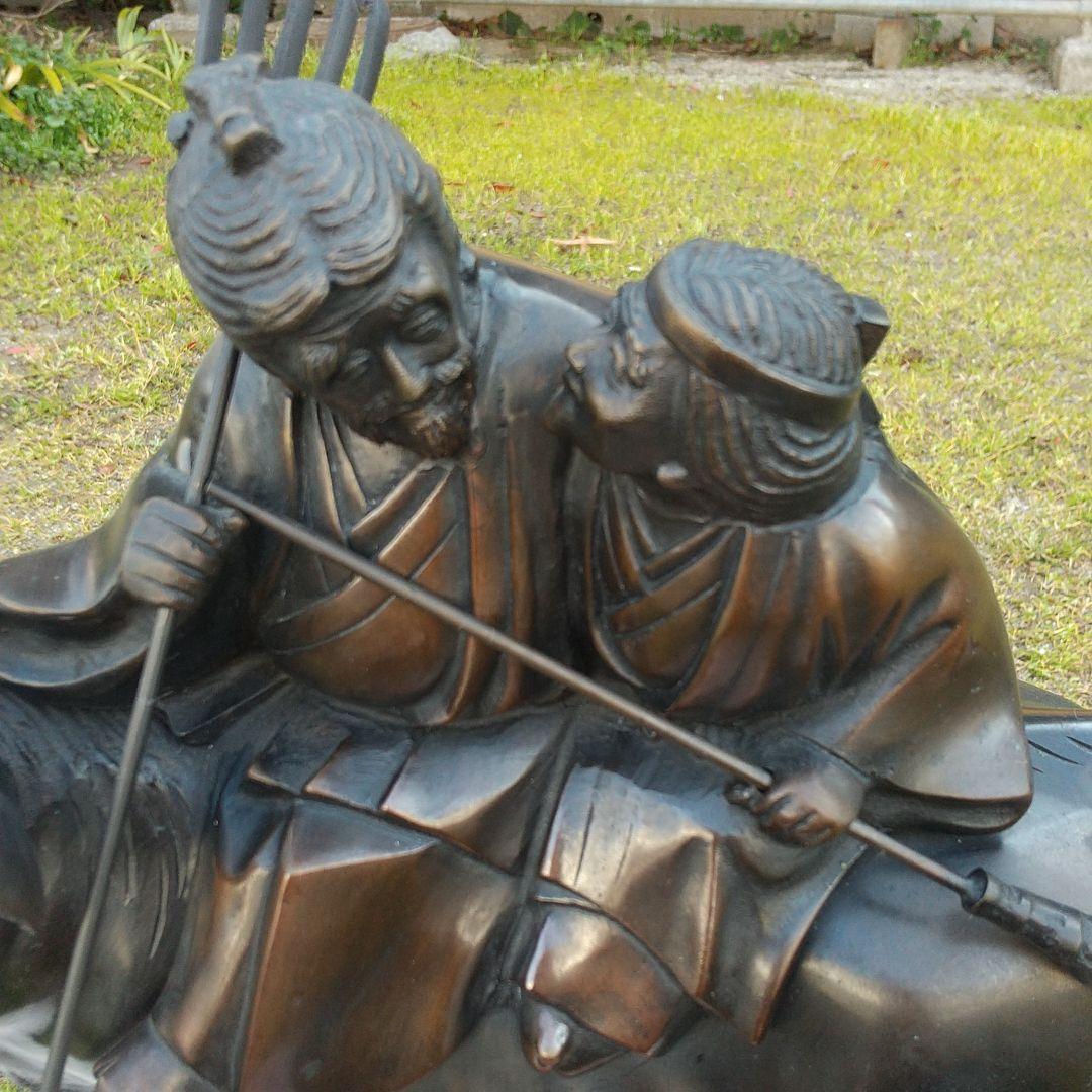 青銅製   夫婦が乗った牛