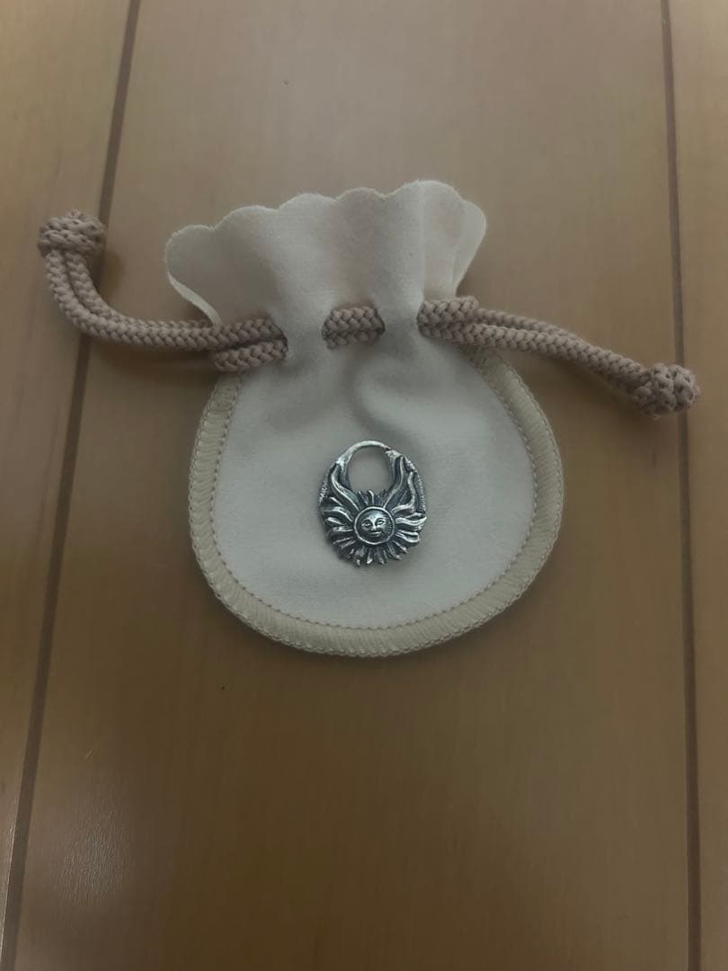 シルバー製ピアス(太陽・波・魚デザイン)