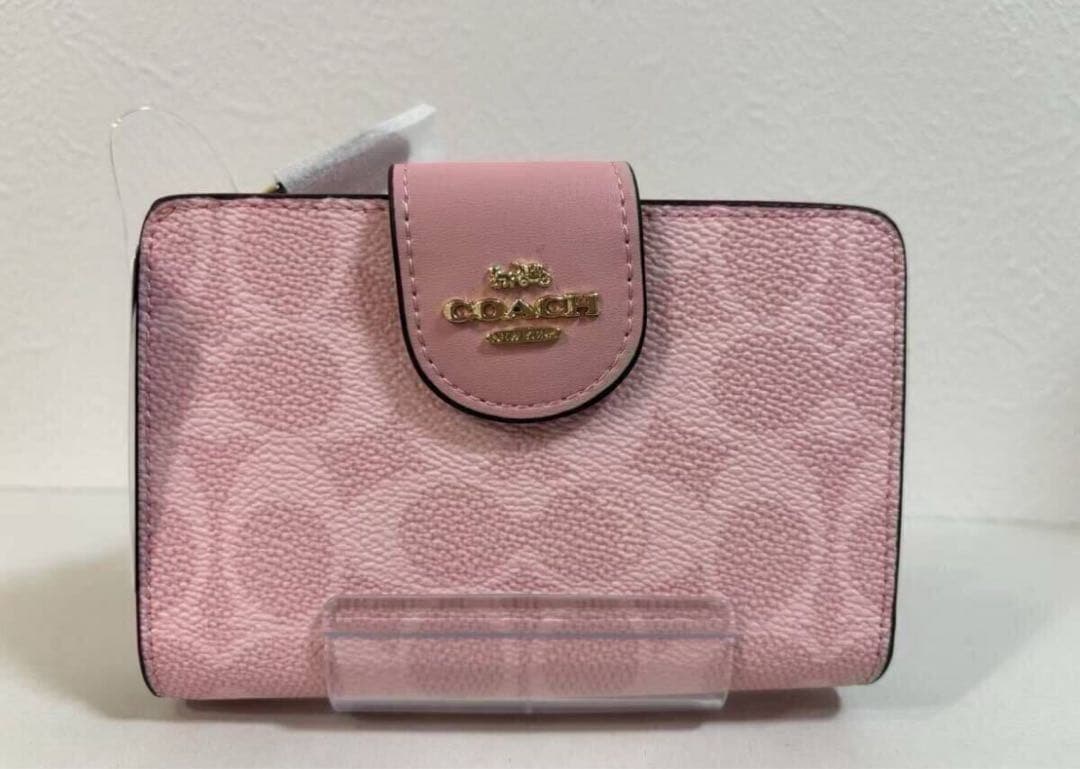 COACH 二つ折り財布　ピンク