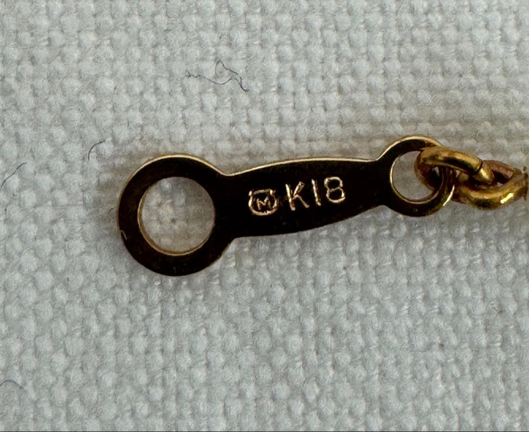 ミキモト　K18 9個の真珠とイエローゴールドチェーンのブレスレット