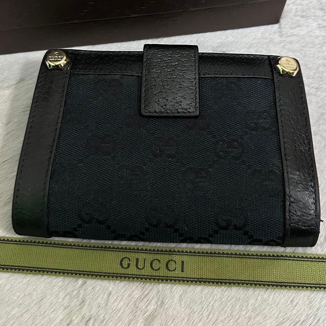 GUCCI グッチ　折り財布　ガマ口　メタルロゴ　キャンバス　GG ブラック