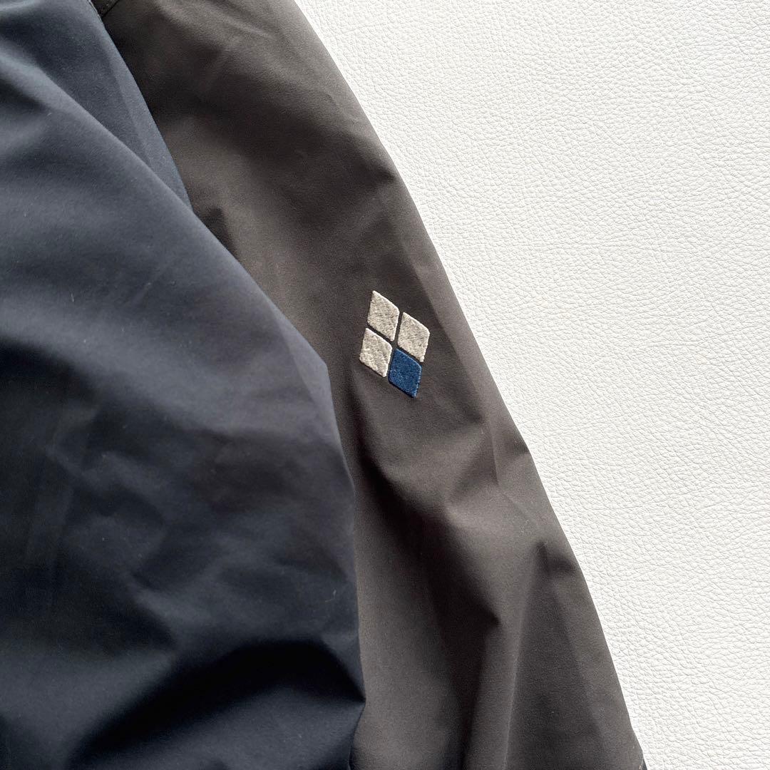 02229 モンベル　シャルモパーカ　スキーウェア　ダウンジャケット グレー