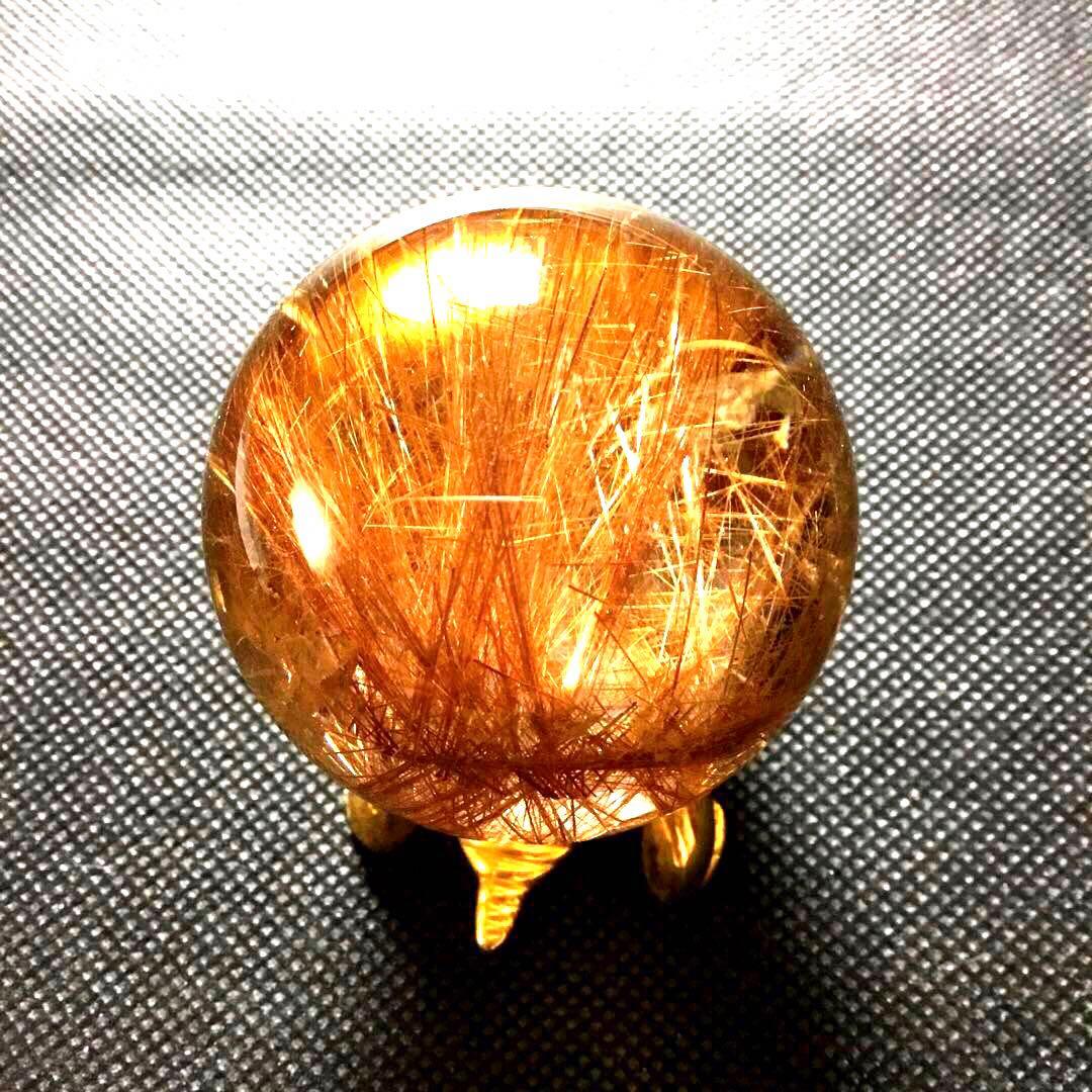 ゴールドルチルクォーツ置物　丸玉　ブラジル産　直経約4.83cm 重さ約160g