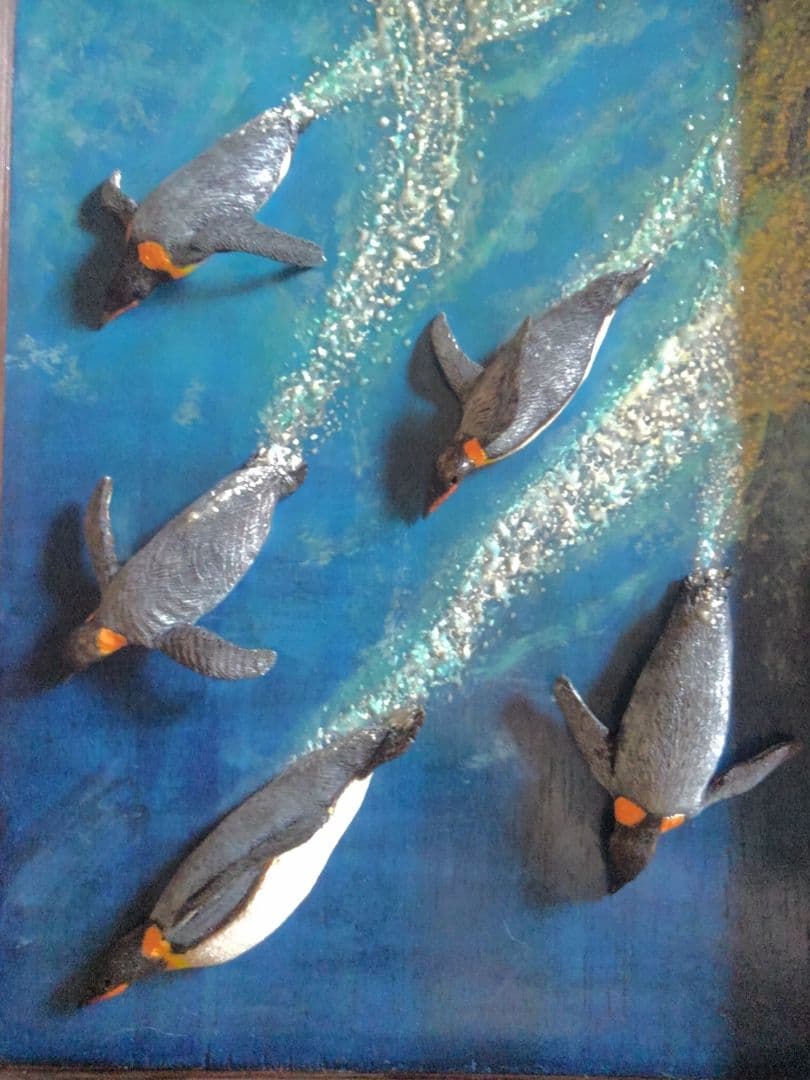 木彫りの皇帝ペンギンの3D壁掛け