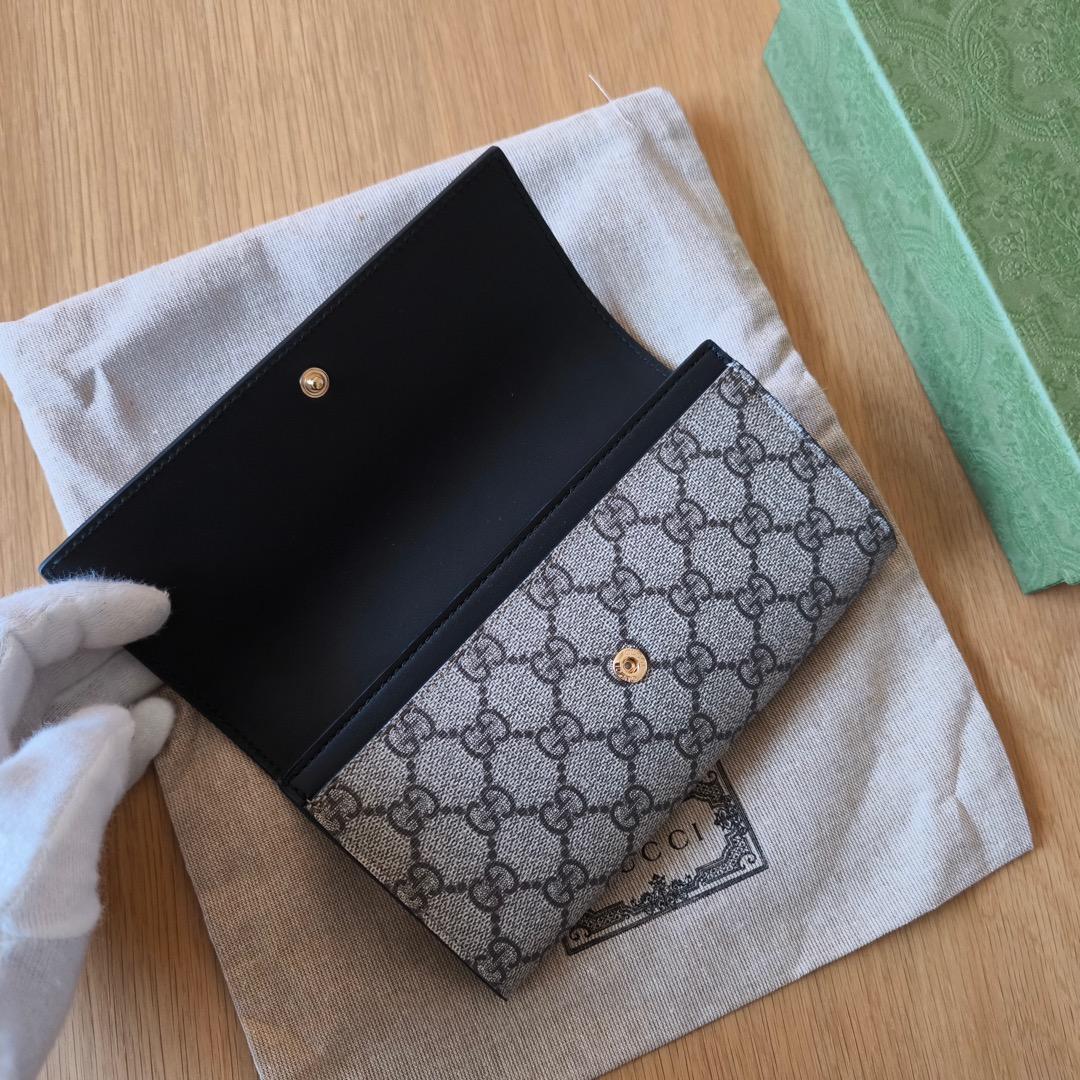 新品未使用！Gucci 人気 GGスプリーム ユニセックス 二つ折り長財布