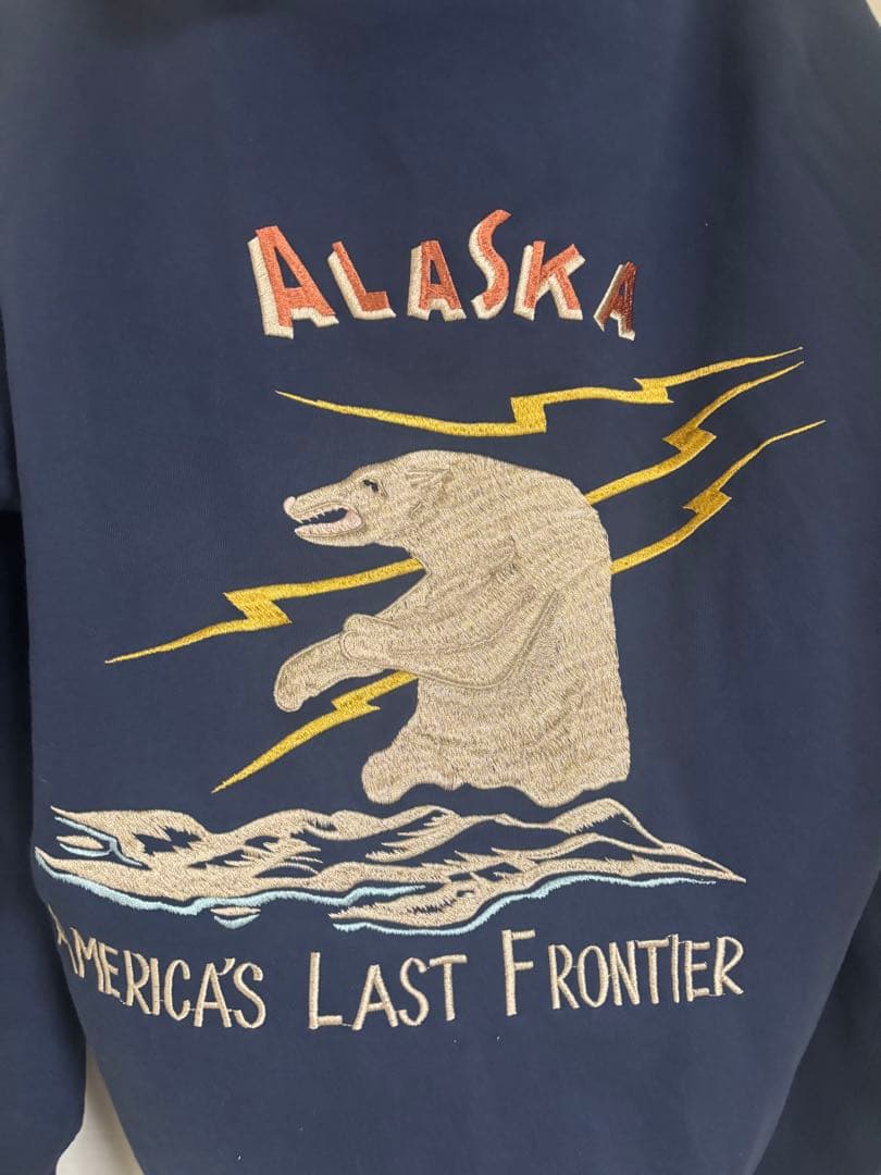 SUKA ZIP PARKA 「EMBROIDERED ALASKA」