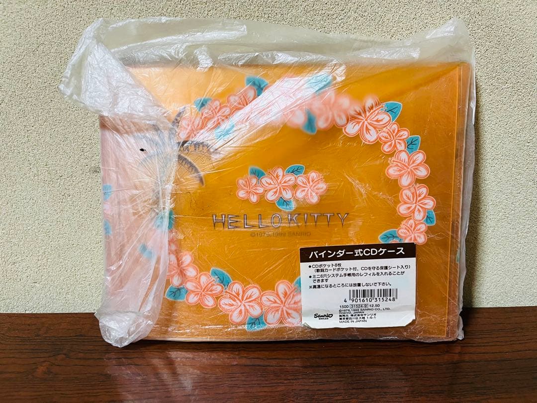 【新品未開封】ハローキティ　バインダー式CDケース ハイビスカス　レトロ