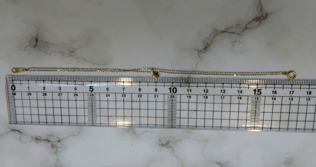売り切り【中古】K18YG K14WG ダイヤ星チャーム付きブレスレット