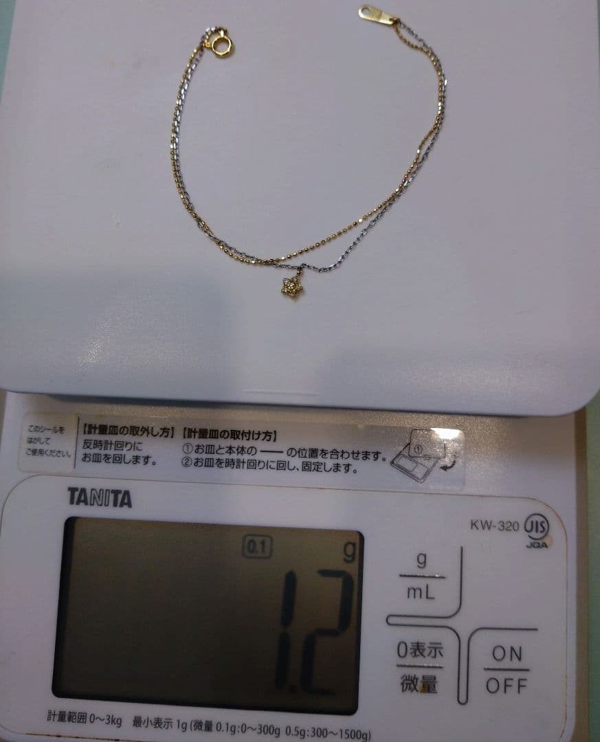 売り切り【中古】K18YG K14WG ダイヤ星チャーム付きブレスレット