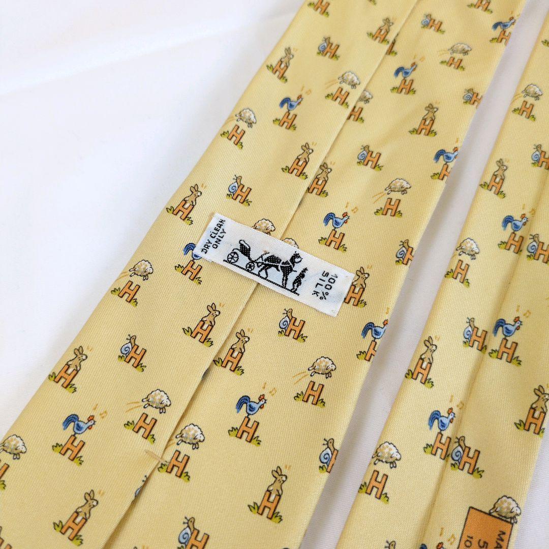 【美品】エルメス ネクタイ イエロー・オレンジ H柄 動物柄【フランス製】