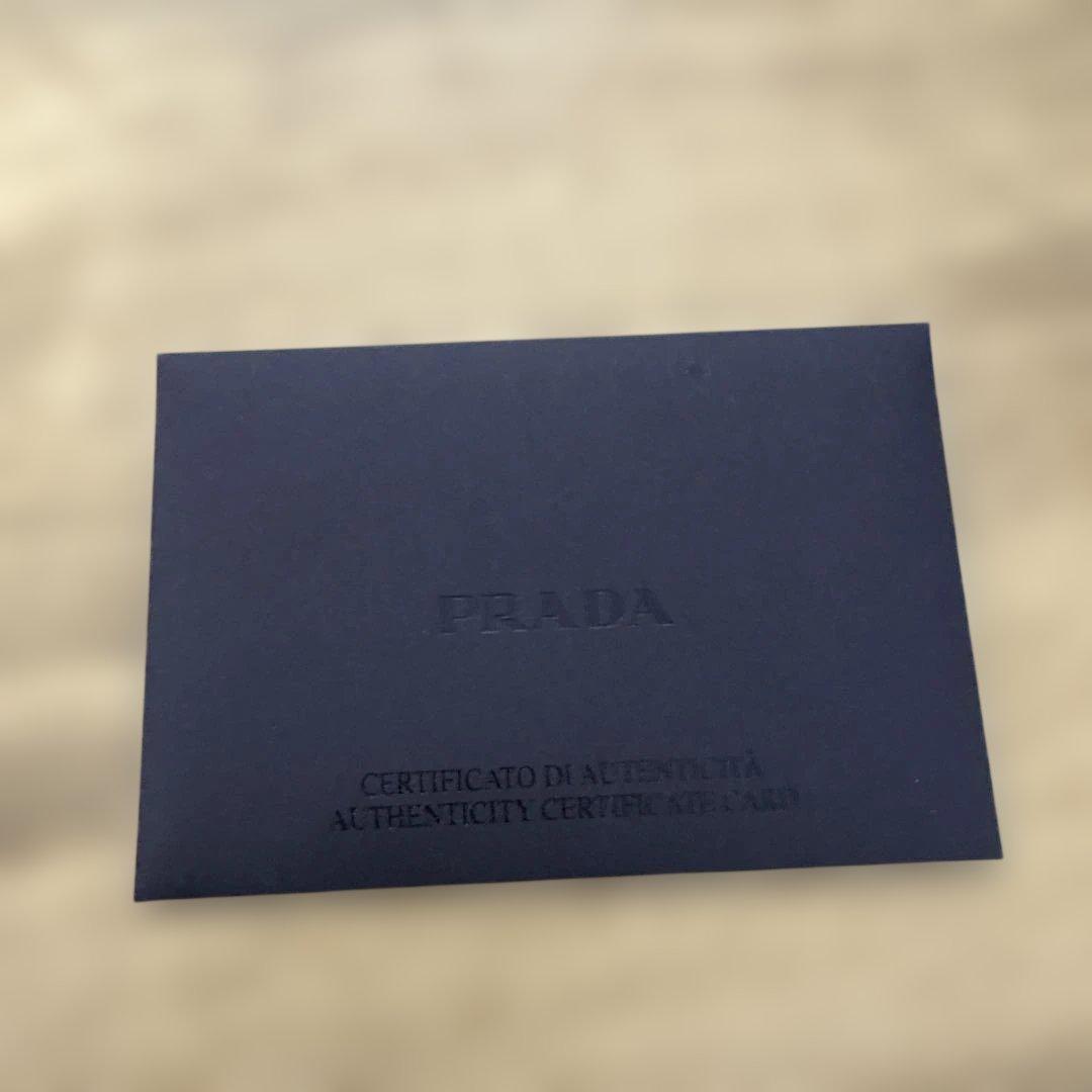早い者勝ち！！【紙袋・証明書・箱付き】PRADA プラダ折り財布　 ネイビー