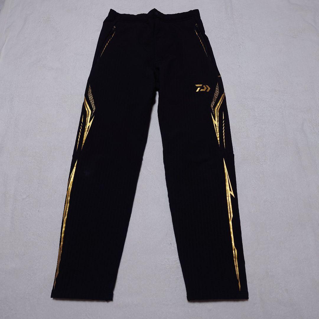 Daiwa トーナメントストレッチジャケットパンツ（上下セット） 黒/金　L
